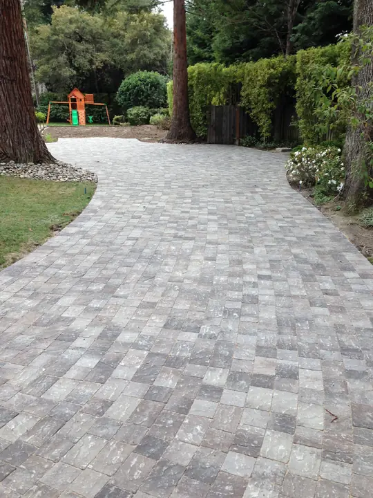 Driveway Paving Grey Paver Driveway Beside The Hedge