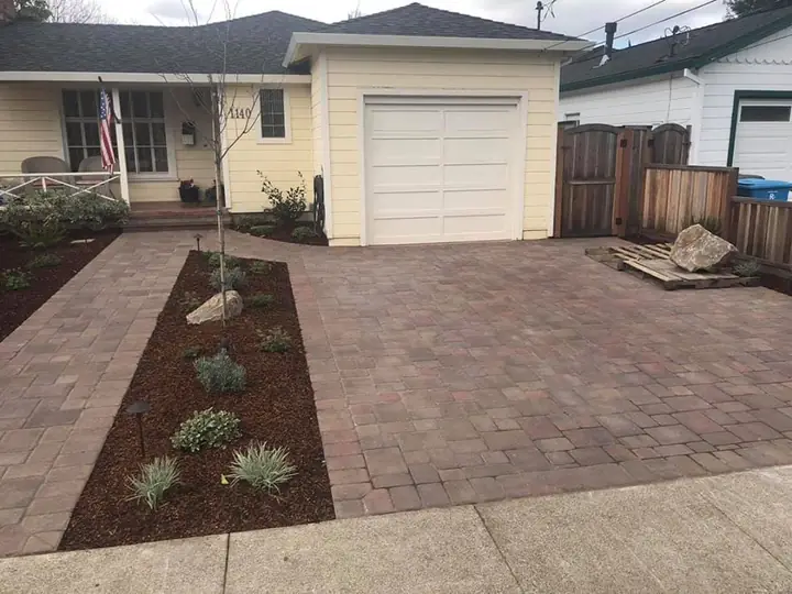Driveway Paving Red Toned Paver Driveway And Planting Bed