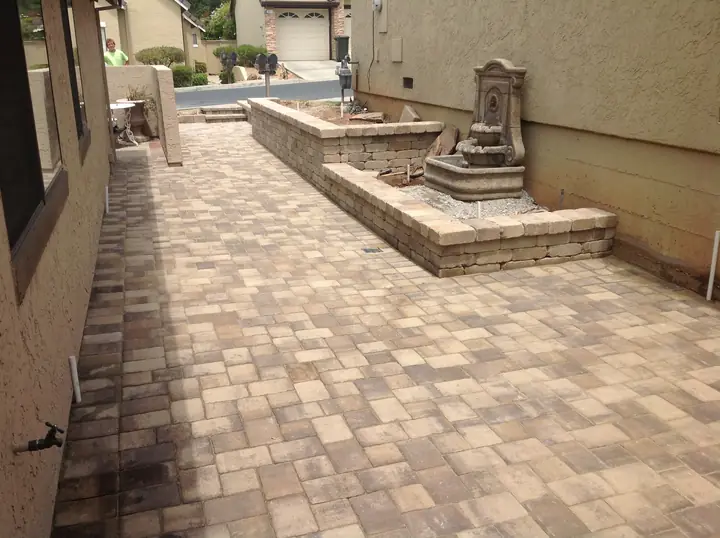 Hardscaping Paver Courtyard With A Stone Fountain