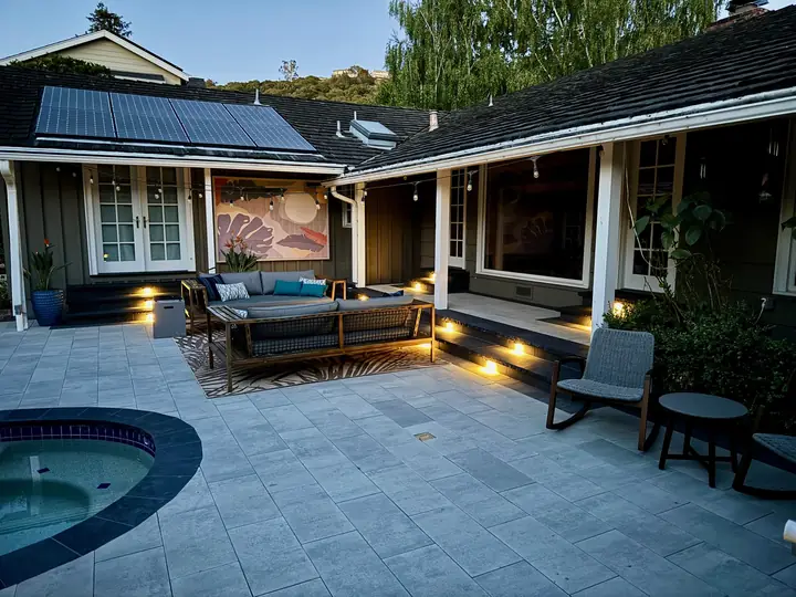 Landscape Lighting Lit Paver Patio Beside The Spa At Dusk