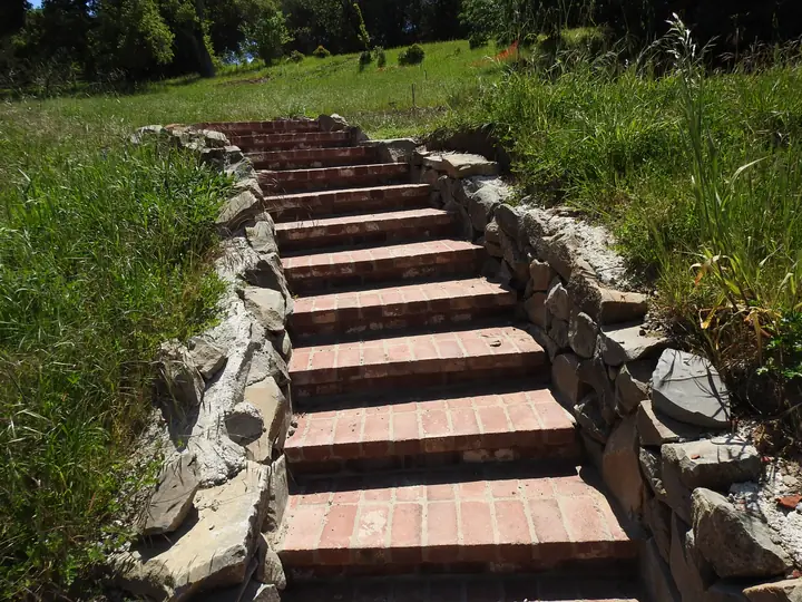 Outdoor Steps Masonry Brick Steps Set Into A Stone Slope