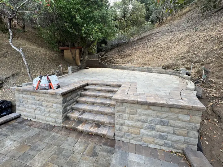 Retaining Wall Construction Stone Faced Wall Holding A Raised Patio