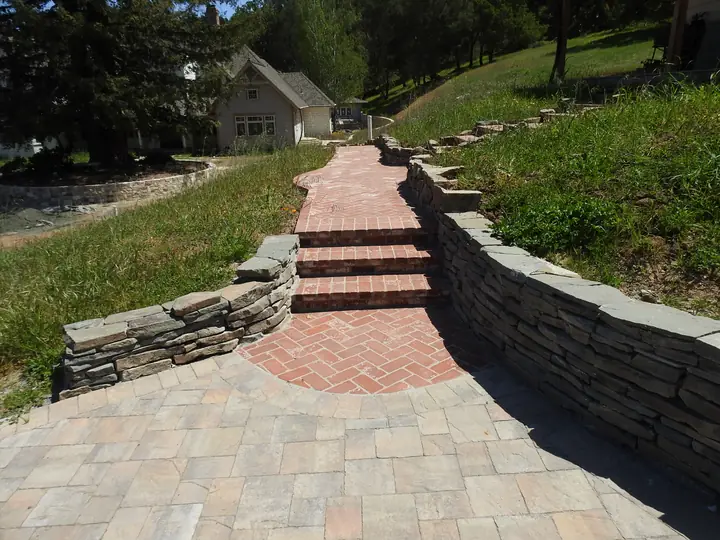 Retaining Wall Construction Stone Walls And Brick Steps On A Hillside